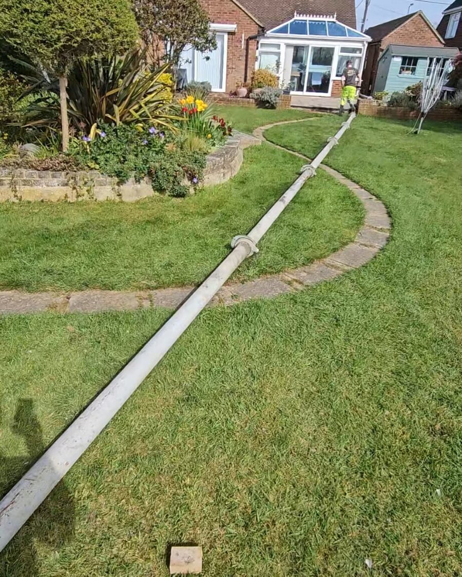 Line pumped across a garden to a rear pour — Kent